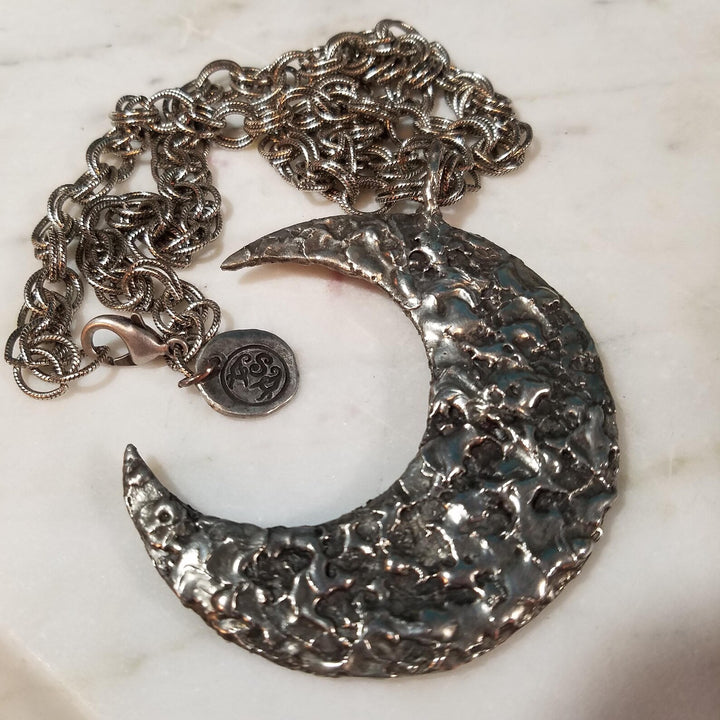 Double-Sided Crescent Moon Pendant